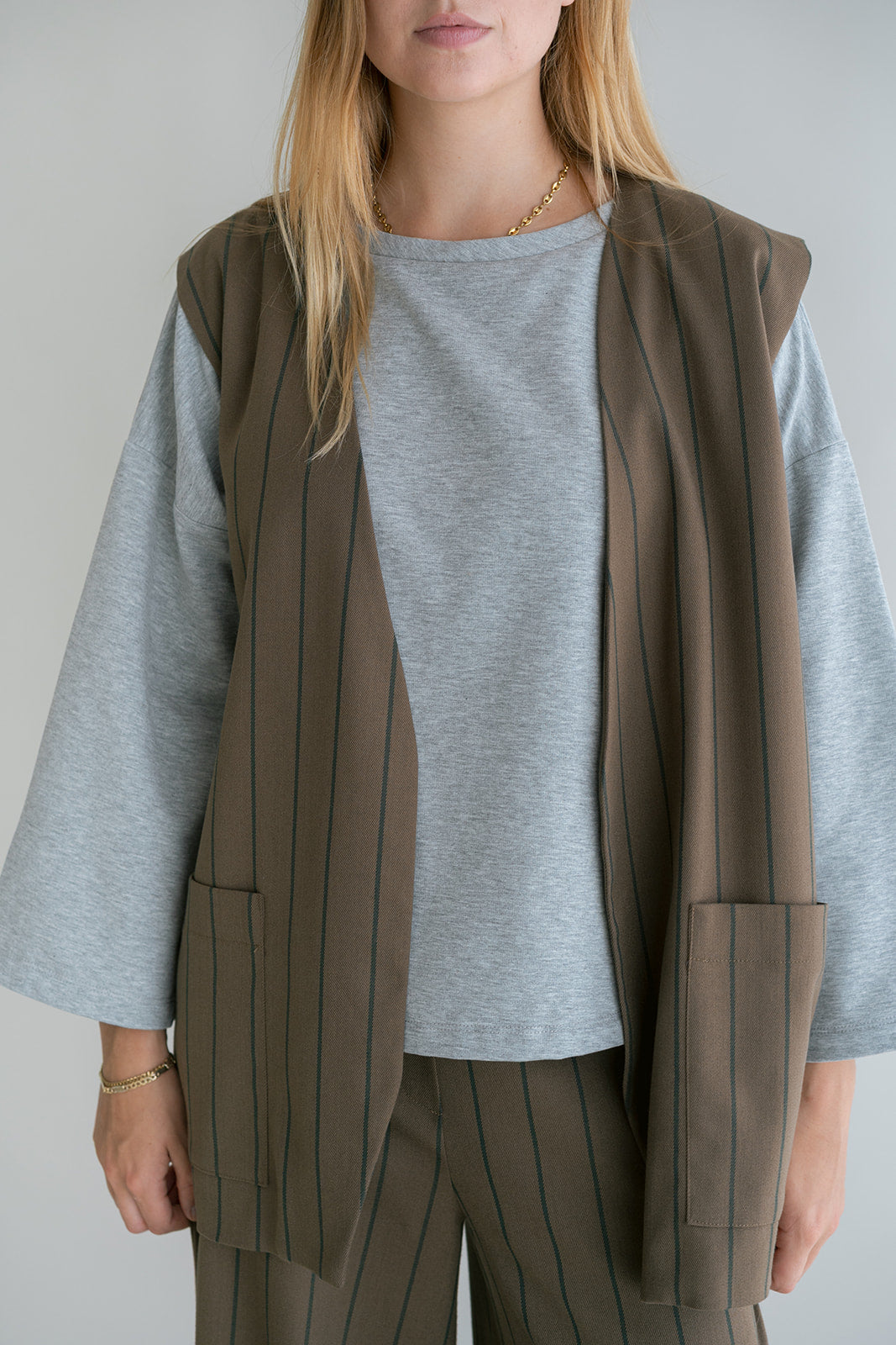Puck Gilet Brown Green Stripe